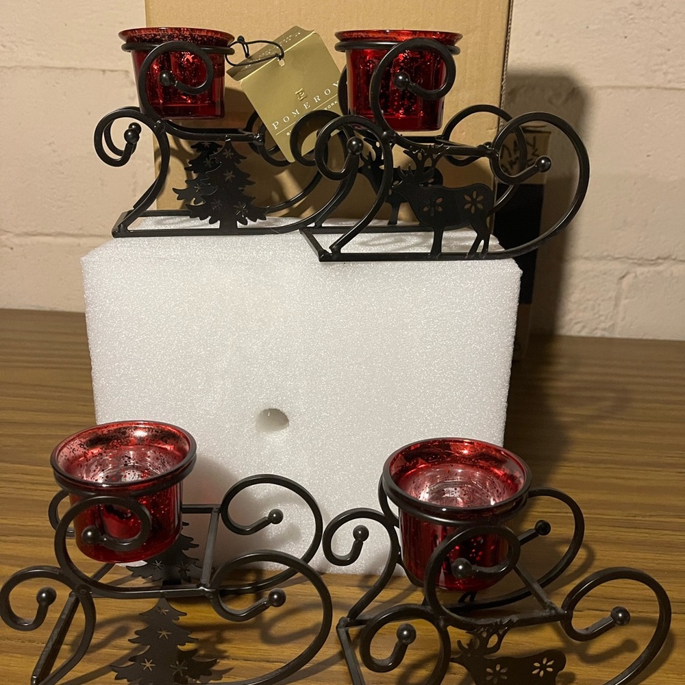 4 piece iron sled set with 4 matching red votive cups